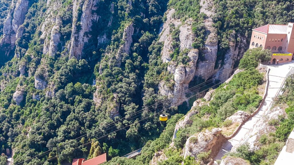 A cable car arriving into Montserrat.