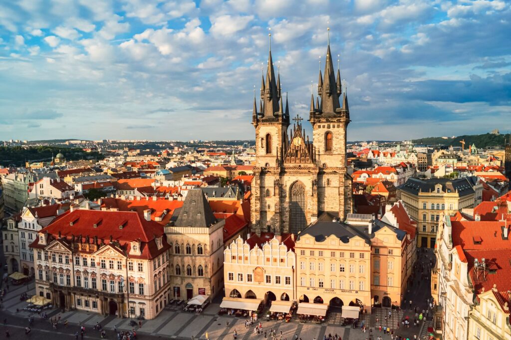 An ariel shot of Old Town Square showing the orange tiled roofs and highlighting some of the beautiful architecture in Prague.