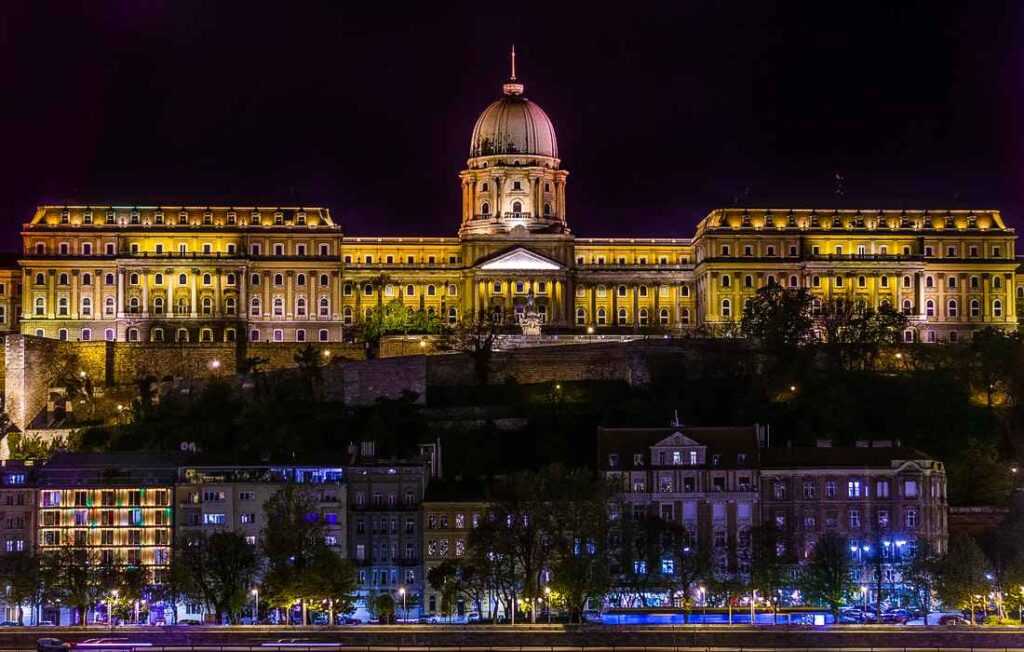 concrete castle lit up during night time