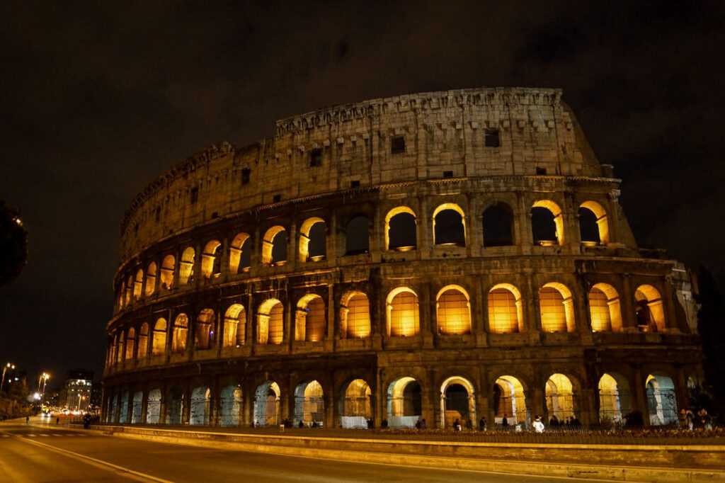 Concrete structure light up during might time. One of the best places to visit in Rome at night