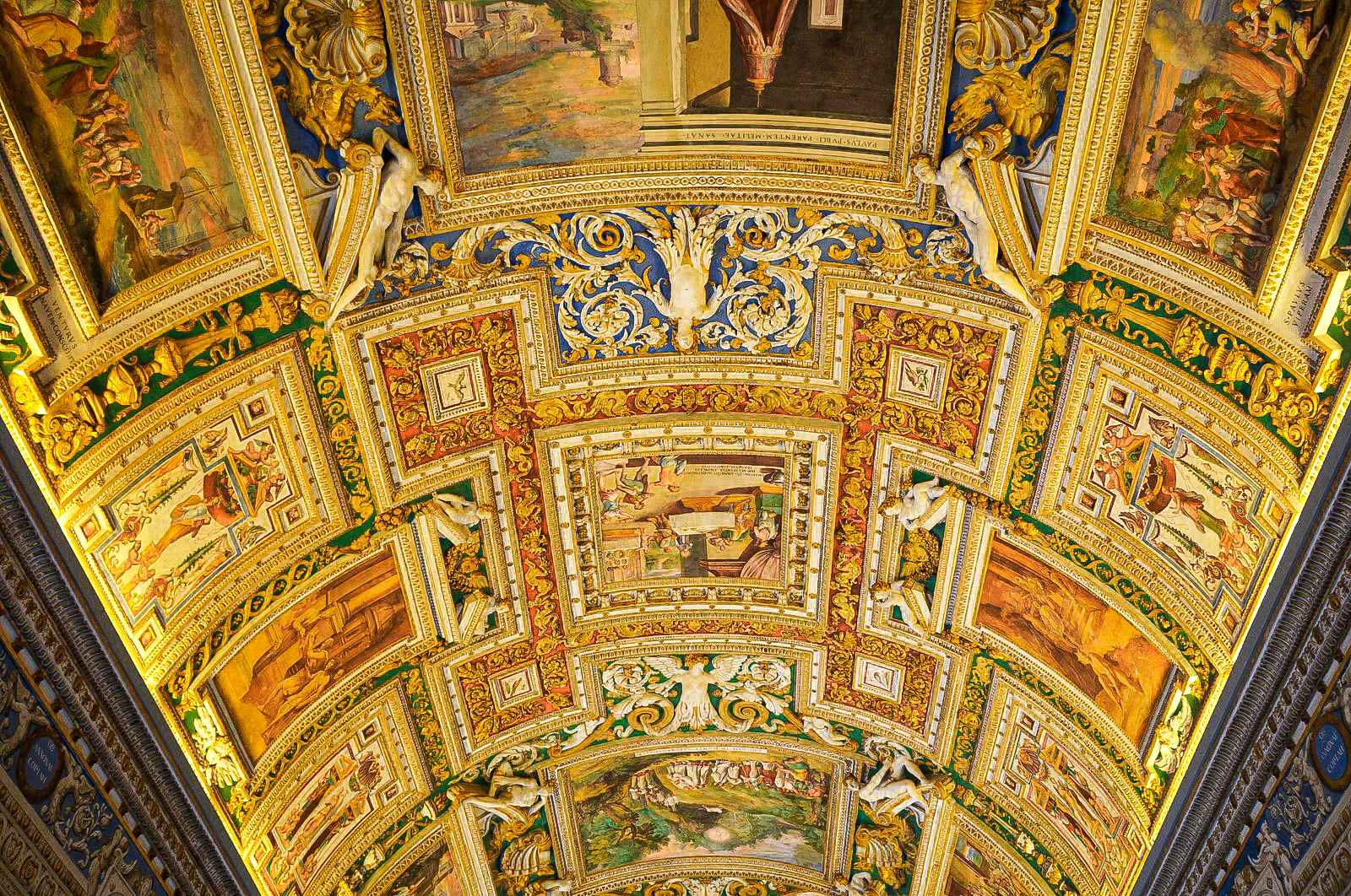 painted ceiling in interior of building. One of the best places to visit in Rome 