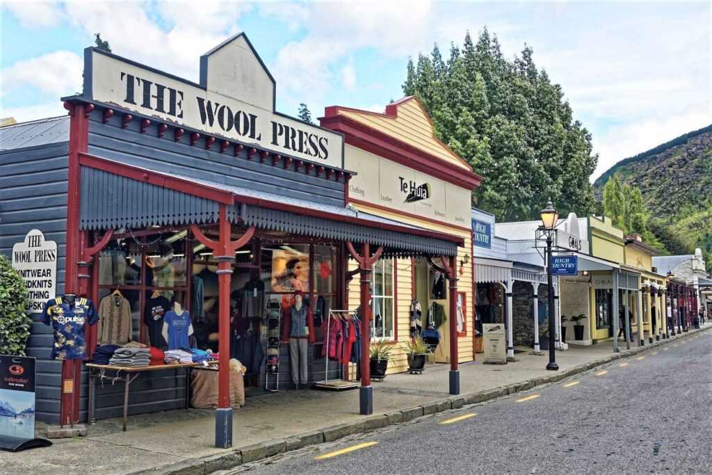 shops located on the side of the road during daytime