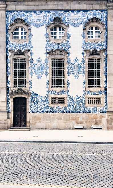 blue and white concrete building with brown door