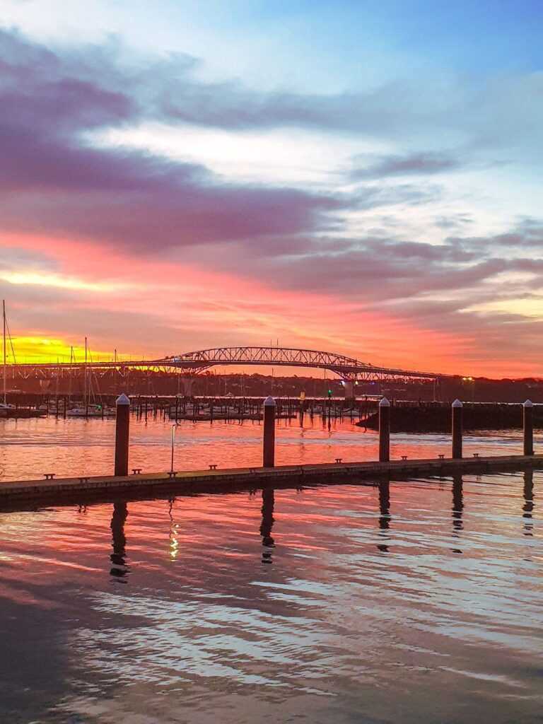 Sunset view of a bridge over water