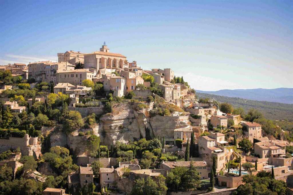 beautiful village perched up on a hill during daytime