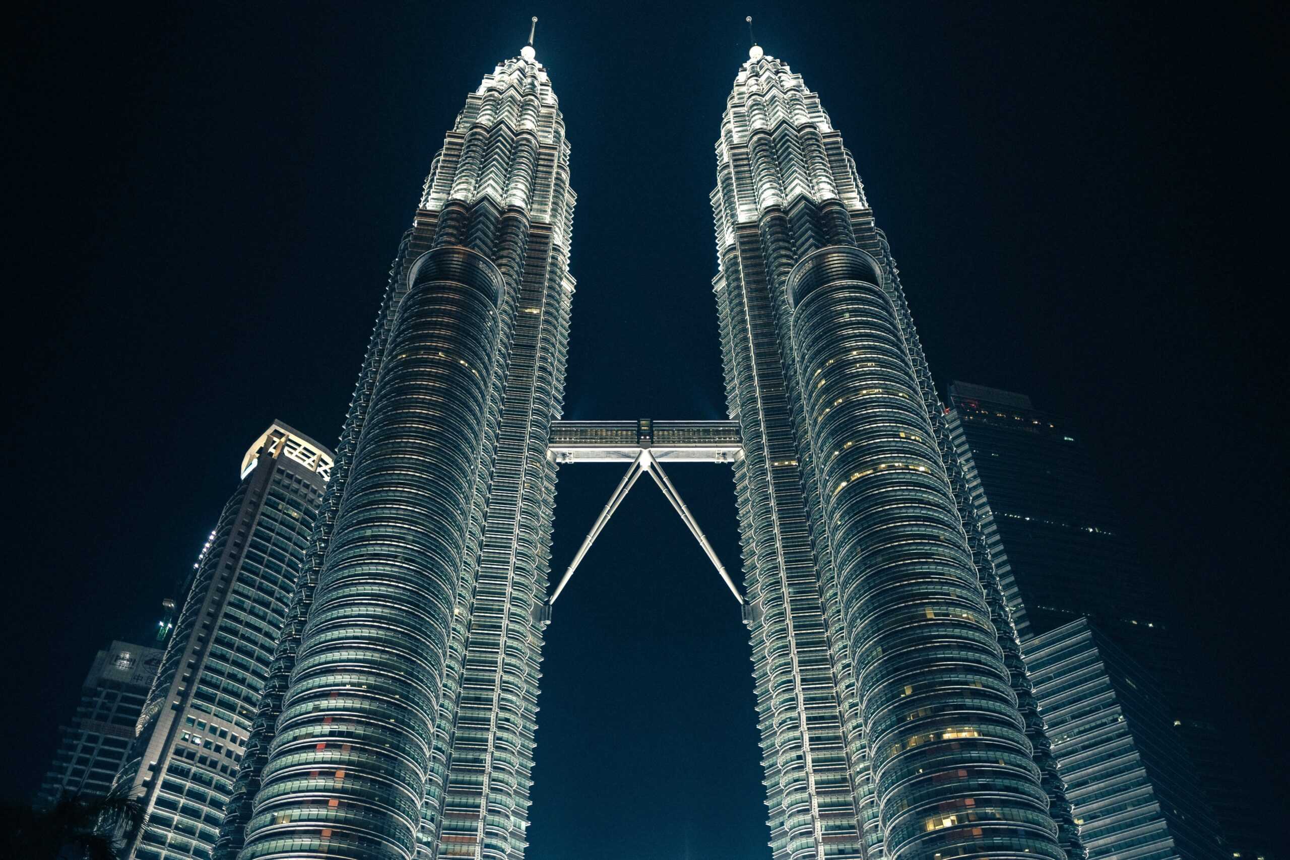 Tall twin towers during night time